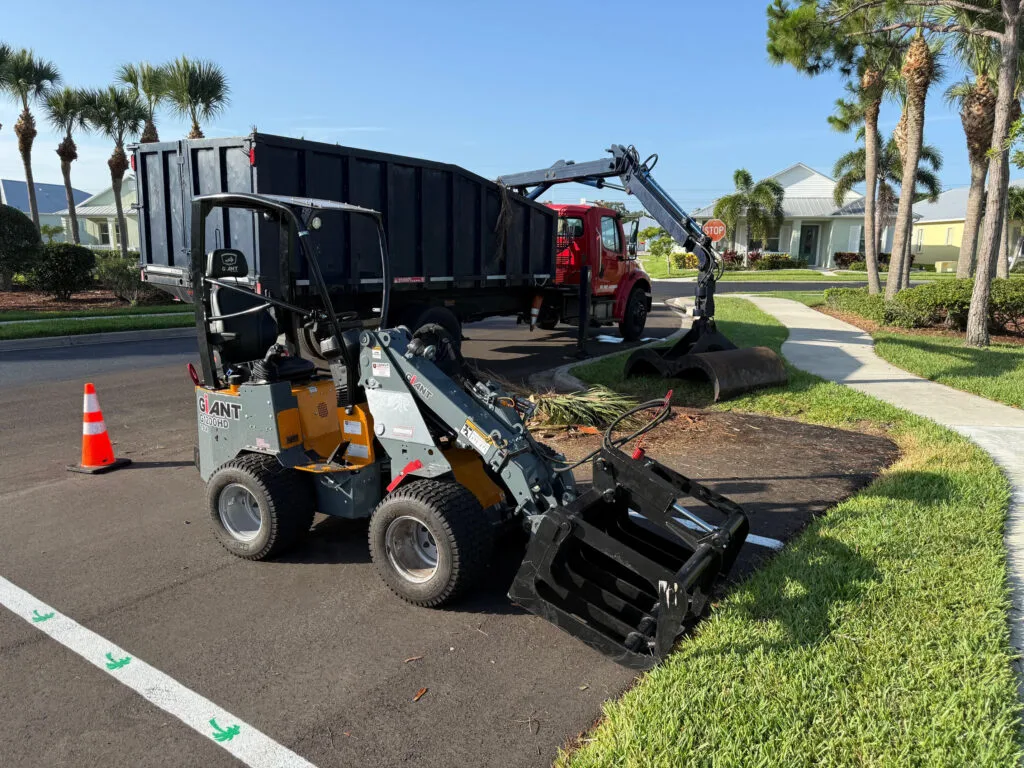 TR giant mini loader moving heavy sections on a job site