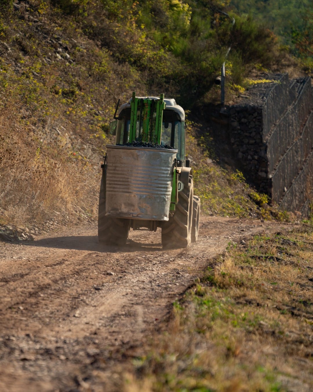 Base rock being spread along a new driveway run